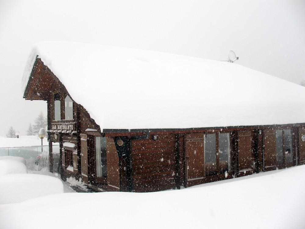 Restaurant Hotel Chalet Del Sole Oulx Buitenkant foto
